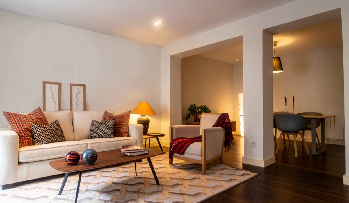 Living room layered with warm ambient lighting in the evening