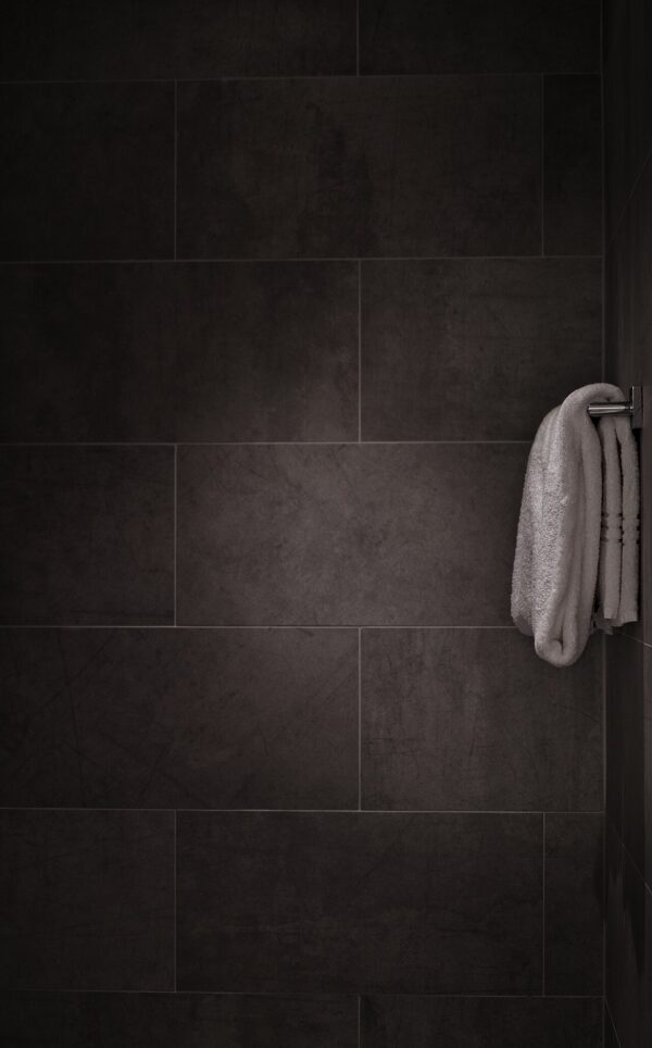 White towel in tiled bathroom (CC0 photo)